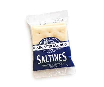 A packaged single serve of Westminster Bakers Saltine Crackers in a clear plastic wrapping with blue and white branding.